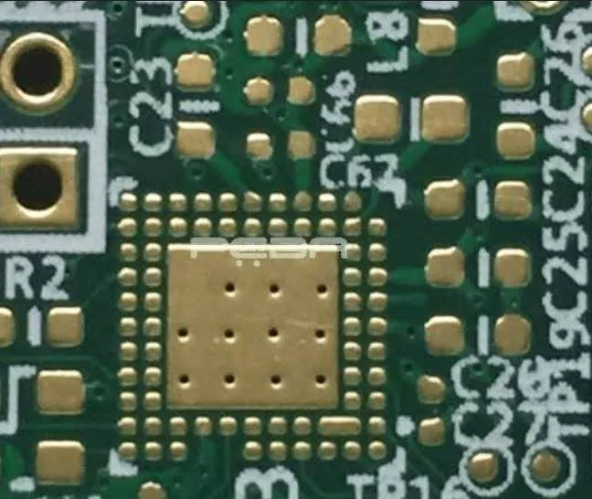 Close-up of a BGA footprint with immersion gold pads and plugged vias
